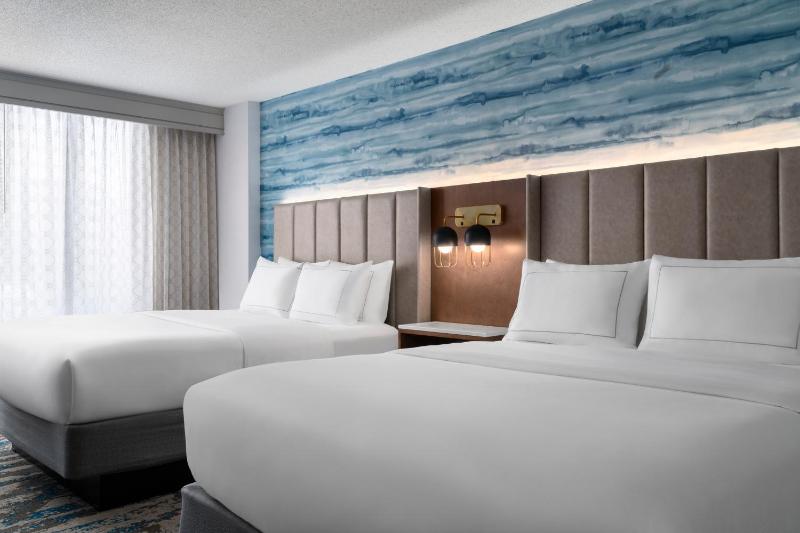 Double Room with Two Double Beds and Bath Tub - Disability Access image 1
