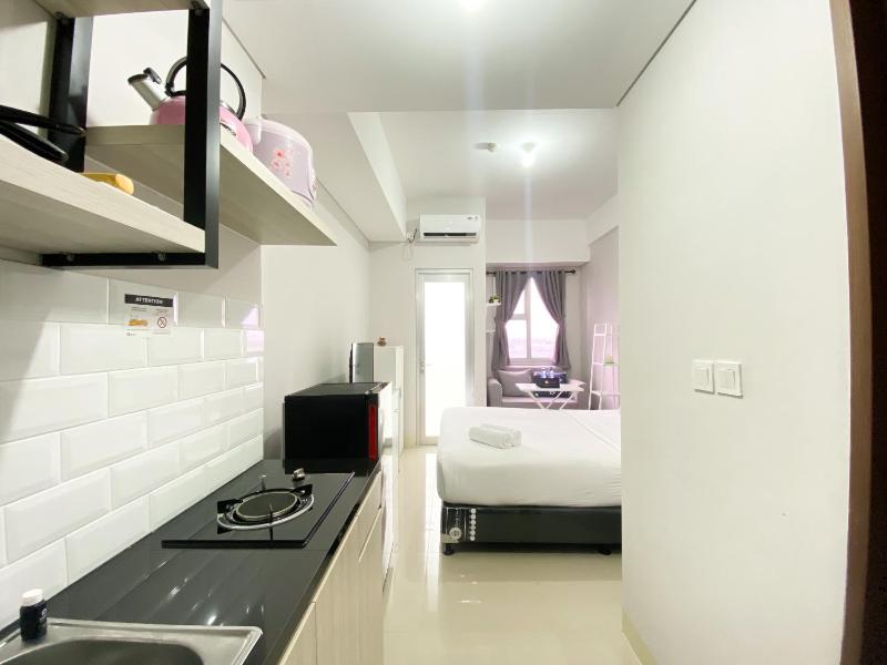 Warm Studio Transpark Juanda Bekasi By Travelio - image 12