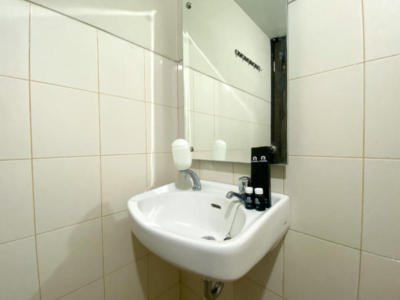Full Furnished with Simply Look Studio Room Mont Blanc Bekasi Apartment By Travelio - image 12