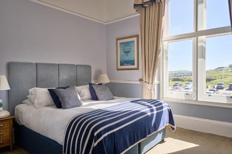 Double or Twin Room with Side Sea View image 1