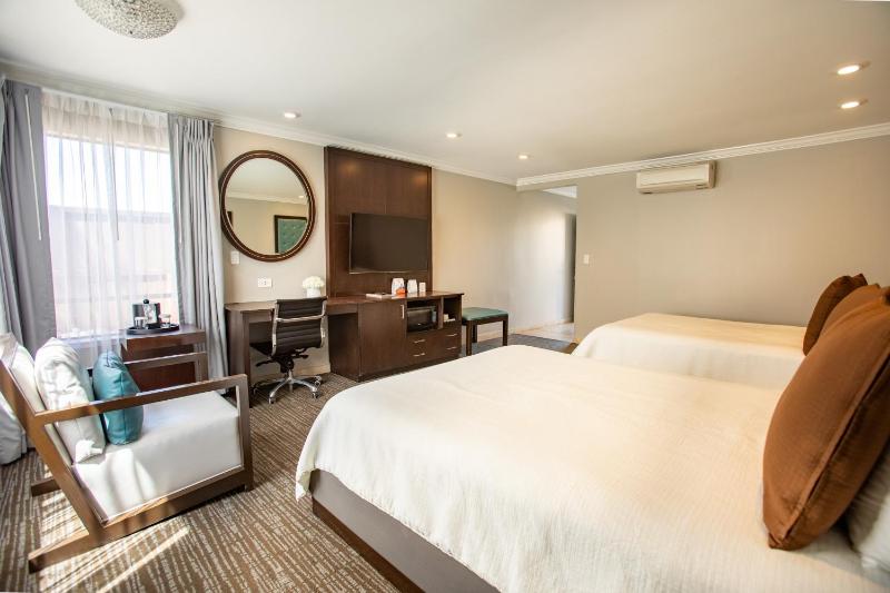 Queen Room with Two Queen Beds and Fireplace image 4