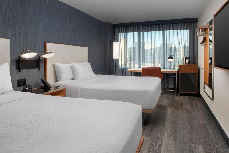 Queen Room with Two Queen Beds - High Floor image 1