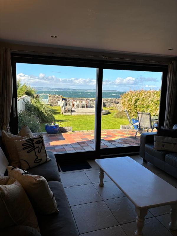 Splash Cottage, Sea lapping Garden Images