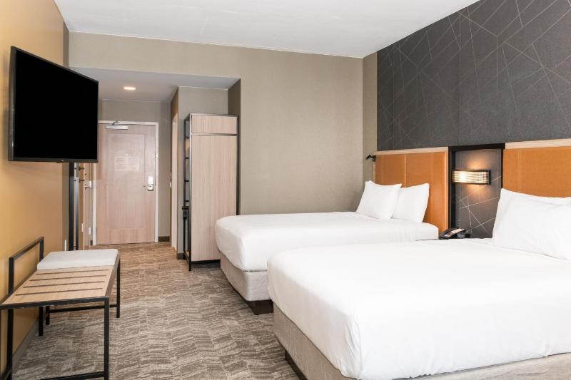 Queen Suite with Two Queen Beds and Sofa Bed image 1