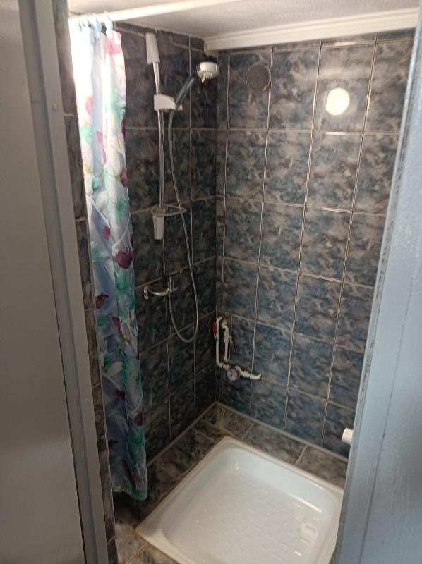 Basic Triple Room with Shared Bathroom image 2