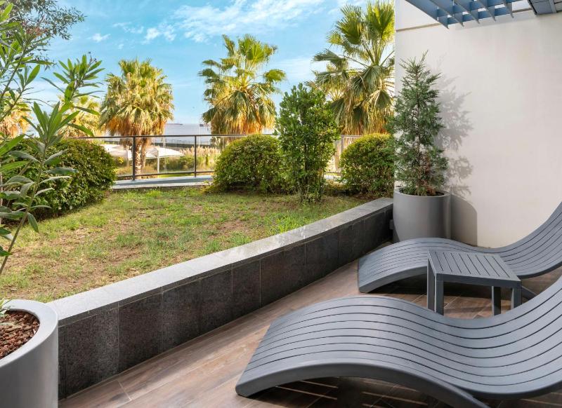 Premium Room with Balcony and Garden View image 2