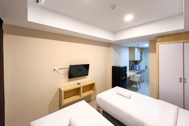 Simply Look Studio at 21st Floor De Prima Apartment By Travelio - image 13