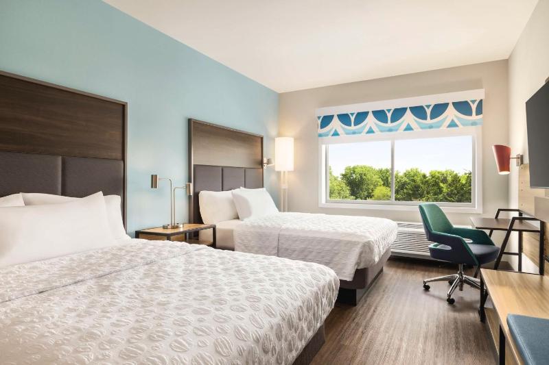 Queen Room with Two Queen Beds and Walk-In Shower image 3