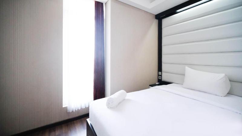 Strategic and Comfy 2BR Apartment at Trillium Residence By Travelio - image 2
