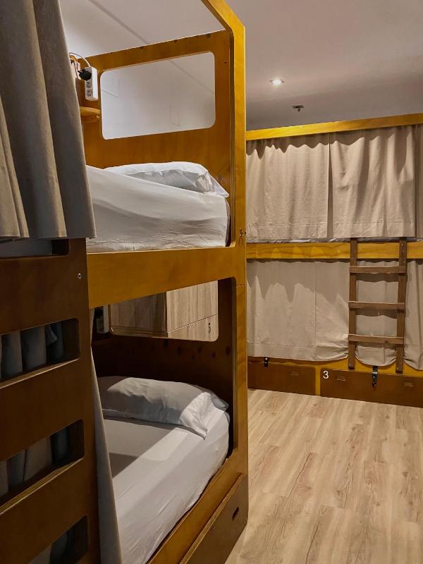 Bed in 8-Bed Dormitory Room with Bathroom image 3