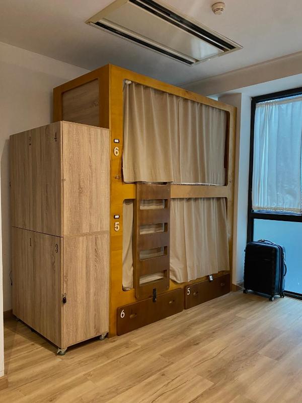 Bed in 8-Bed Dormitory Room with Bathroom image 4