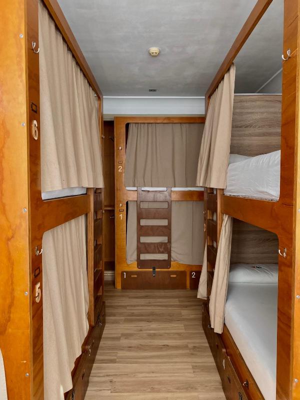 Bed in 6-Bed Dormitory Room with Shared Bathroom image 1