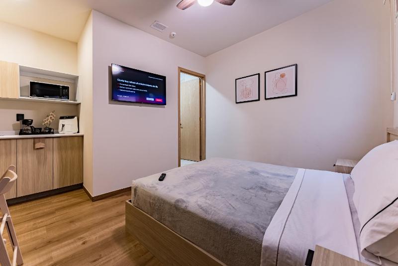 Suites Monterrey by Escajal Rooms - image 42