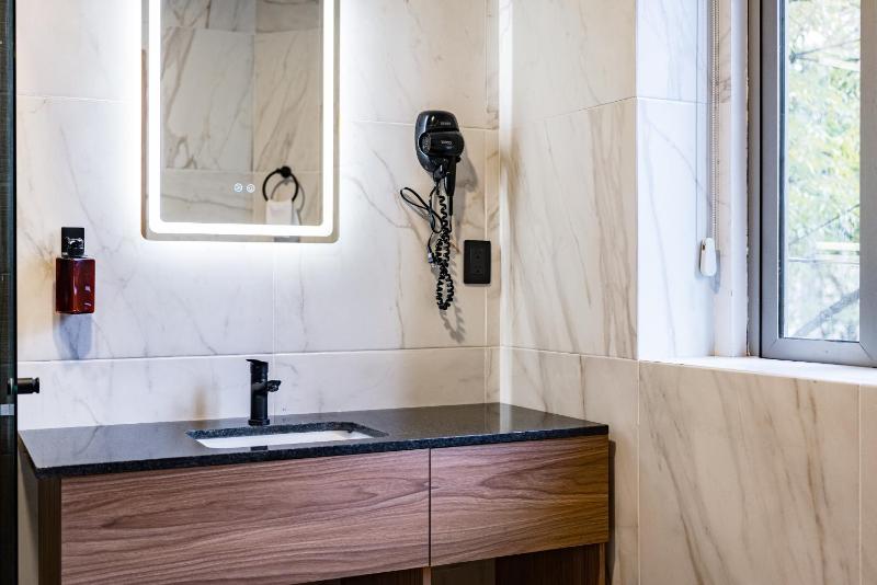 Suites Monterrey by Escajal Rooms - image 11