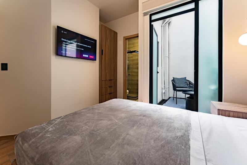 Suites Monterrey by Escajal Rooms - image 31