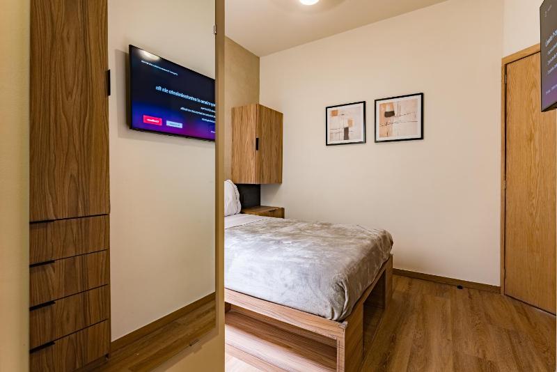 Suites Monterrey by Escajal Rooms - image 12