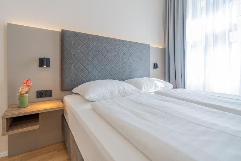 Das Jedermann Boutiquehotel mit Stadtgarten - image 2