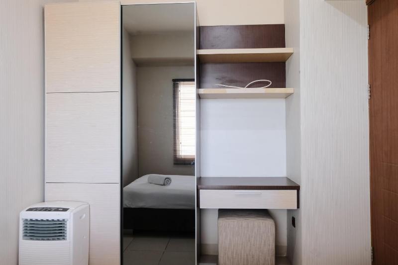 Spacious 3BR Combined Unit at Pinewood Apartment By Travelio - image 11