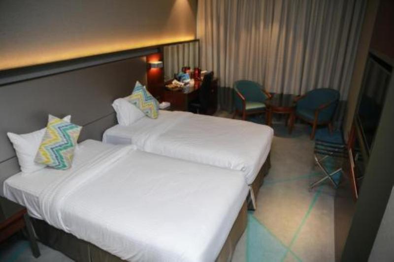 Deluxe Double Room (2 Adults + 1 Child) image 1