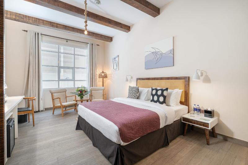 Staycation Package - Boutique Double Room with Complimentary Beach Towel and Umbrella, Welcome Juice, 10% Off Laundry, Early Check-in at 10am & Late Check-out at 3pm image 1