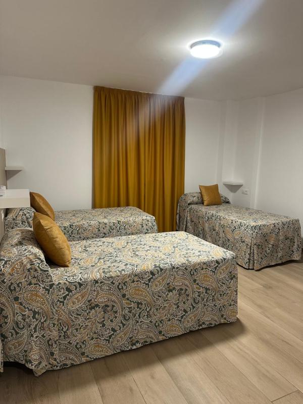 Triple Room with Private Bathroom image 1