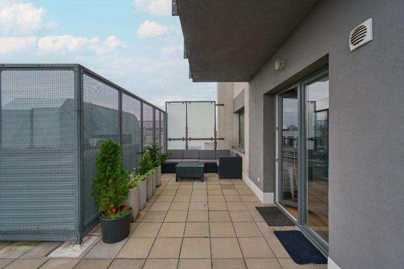Beautiful Apartment with Spacious Balcony by Noclegi Renters - image 17