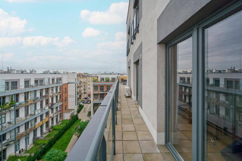 Beautiful Apartment with Spacious Balcony by Noclegi Renters - image 27