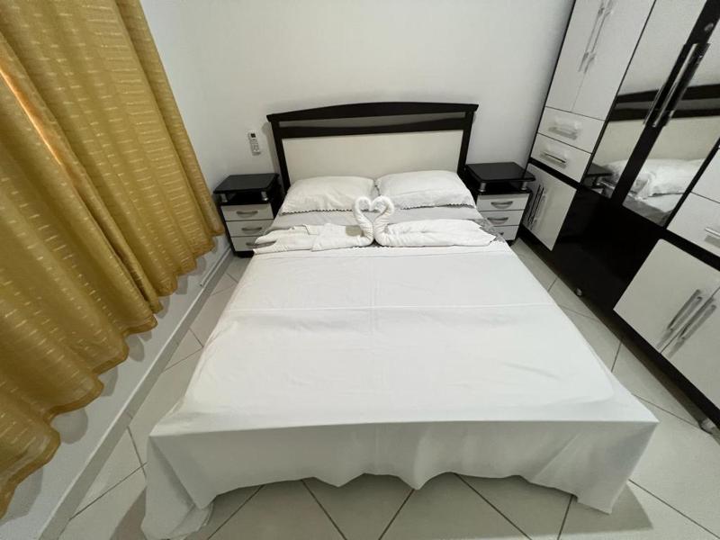 MELHOR ESCOLHA - 90 metros da Beira Mar - 2 Quartos com AR CONDICIONADOS SPLIT Air Fryer Wi-Fi Disney Plus Star Plus HBO Max Cadeiras de Praia Caixa Térmica - 7 pessoas - Perto de tudo! - image 12