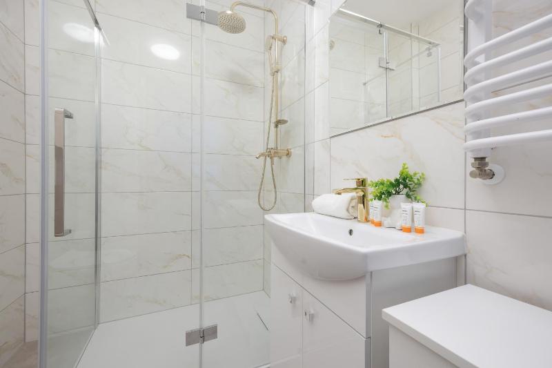 Pileckiego Apartments with Parking & Balcony by Noclegi Renters - image 2