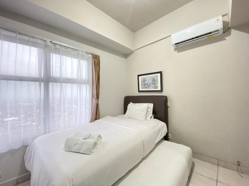 Spacious and Homey 2BR Apartment at Newton Residence By Travelio - image 7