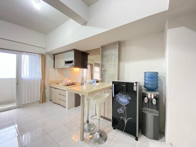 Spacious and Homey 2BR Apartment at Newton Residence By Travelio - image 4