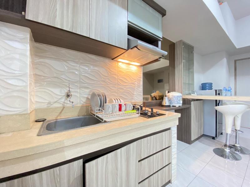 Spacious and Homey 2BR Apartment at Newton Residence By Travelio - image 9