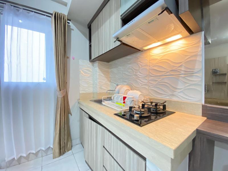 Spacious and Homey 2BR Apartment at Newton Residence By Travelio - image 11