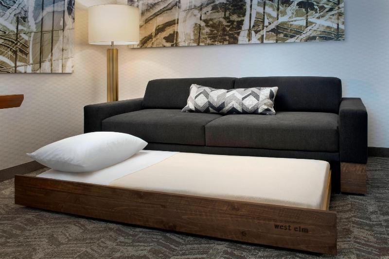 Two Queen beds Studio with Sofa Bed image 2