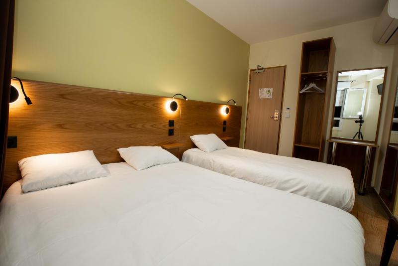 Triple Room (1 Double Bed + 1 Single Bed) image 4