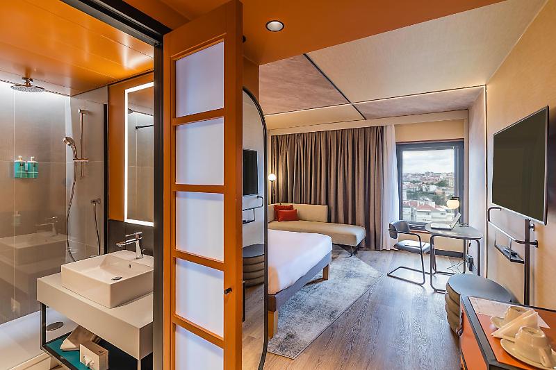 Superior Triple Room with One Queen Bed and One Sofa Bed image 3