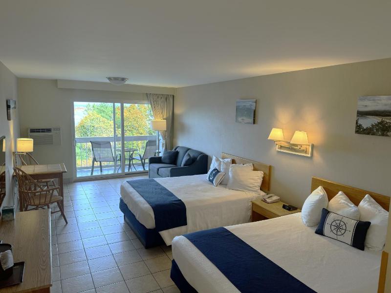 Family Room with Ocean View and Balcony, 2 Queen Beds, Sofa Bed (1st Floor NON-PET) image 4
