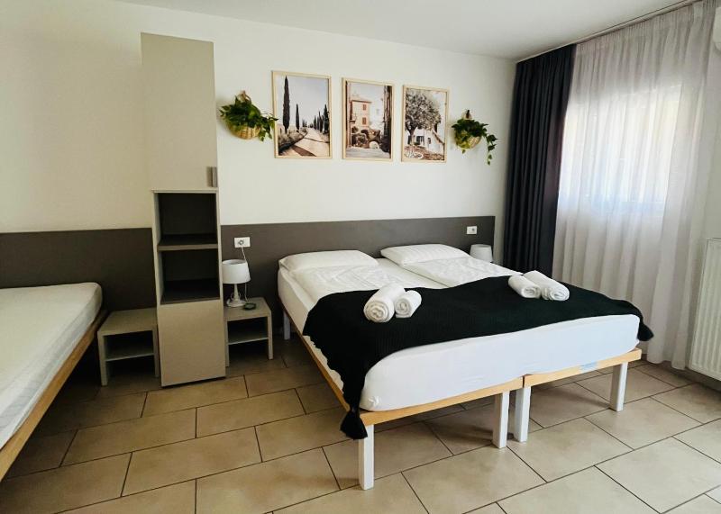 Quadruple Room with Balcony image 1