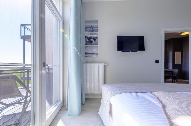 Ostseestern - 5-Sterne Ferienwohnung mit Südbalkon am Bodden - image 10