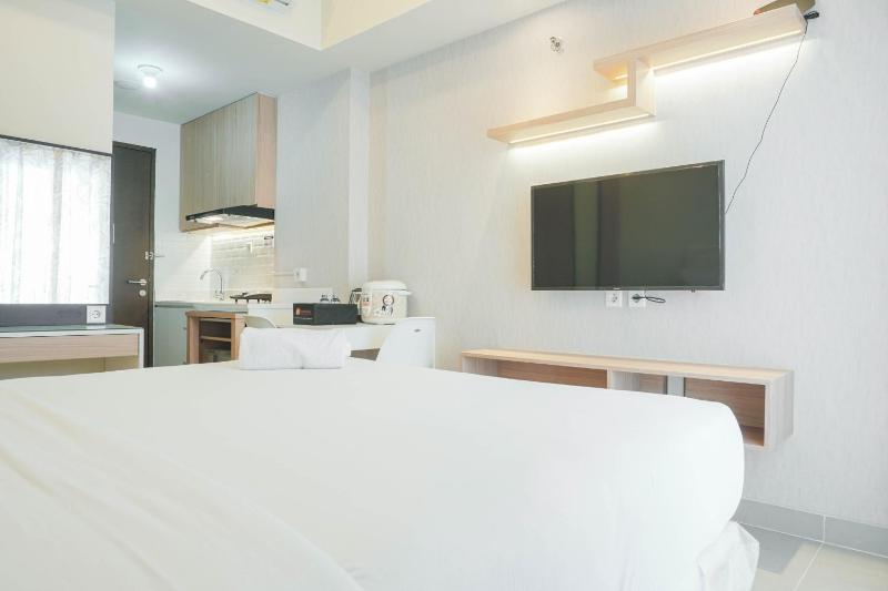 Cozy Living Studio Apartment Mustika Golf Residence By Travelio - image 2