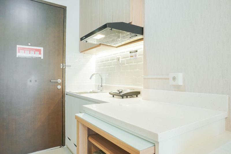 Cozy Living Studio Apartment Mustika Golf Residence By Travelio - image 16