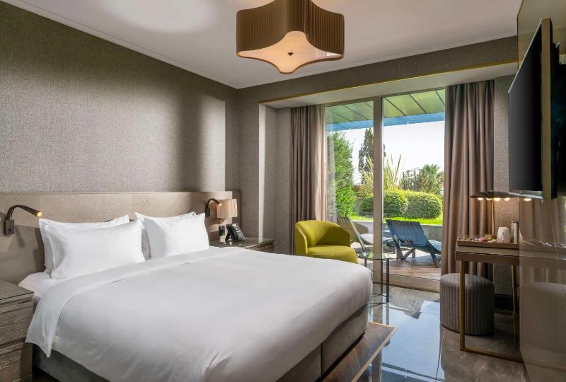 Premium Room with Balcony and Garden View image 1