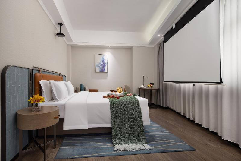 Anya Hotel -Next to Jiefang West Bar Street 2 minutes to the subway station free coffee free laundry free gym huge windows - image 2