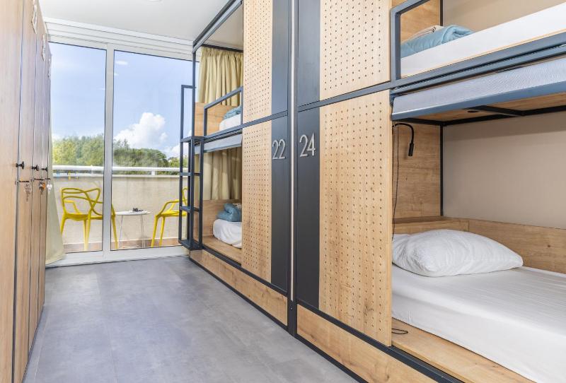 Bed in 4-Bed Mixed Dormitory Room with Sea View image 1