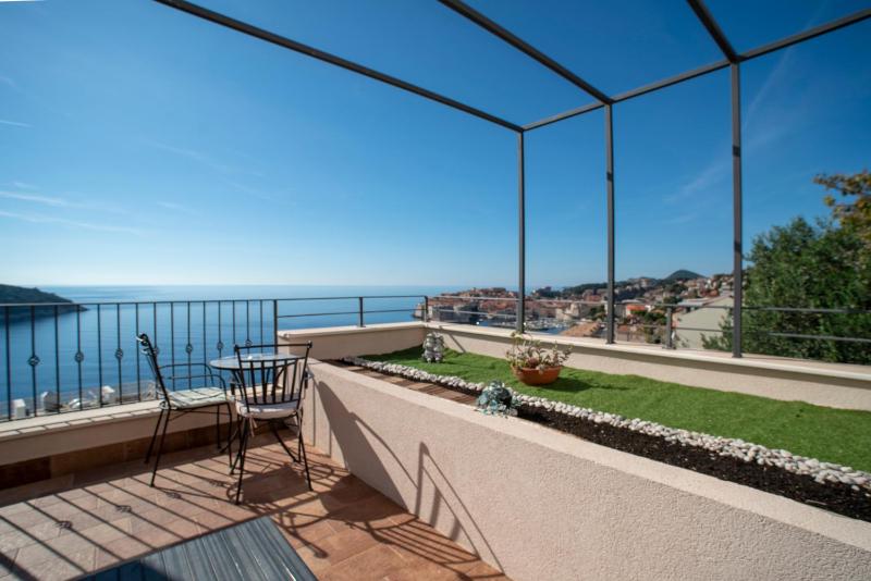 One-Bedroom Apartment with Sea View and Terrace image 1