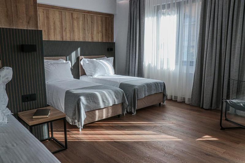 Junior Suite with One Double Bed and One Single Bed - Non-Smoking image 2