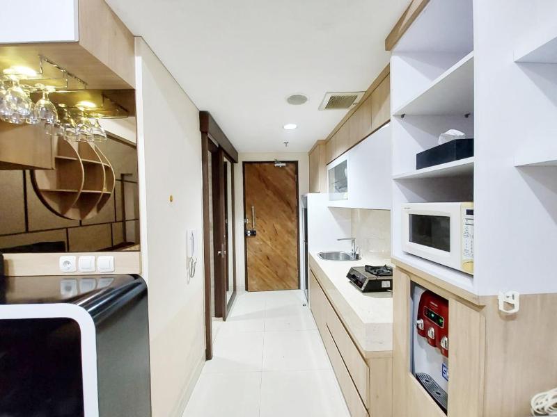Modern Look 1BR at Uttara The Icon Apt By Travelio - image 15