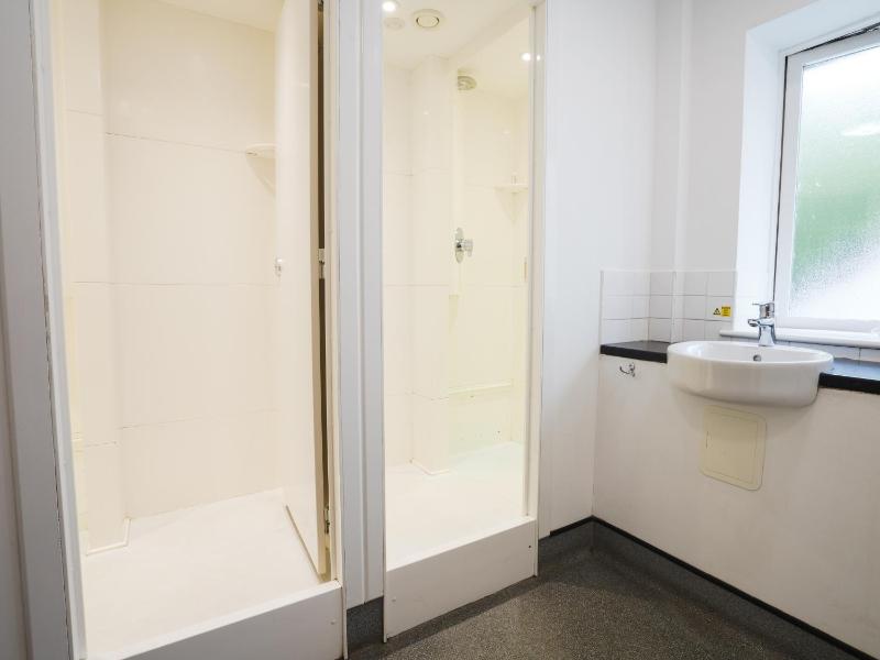 Bunk Bed in Male Dormitory Room with Shared Bathroom image 2