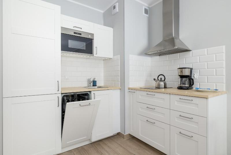 Deluxe Apartament Baltic Wave Basen Siłownia Parking by Noclegi Renters - image 12