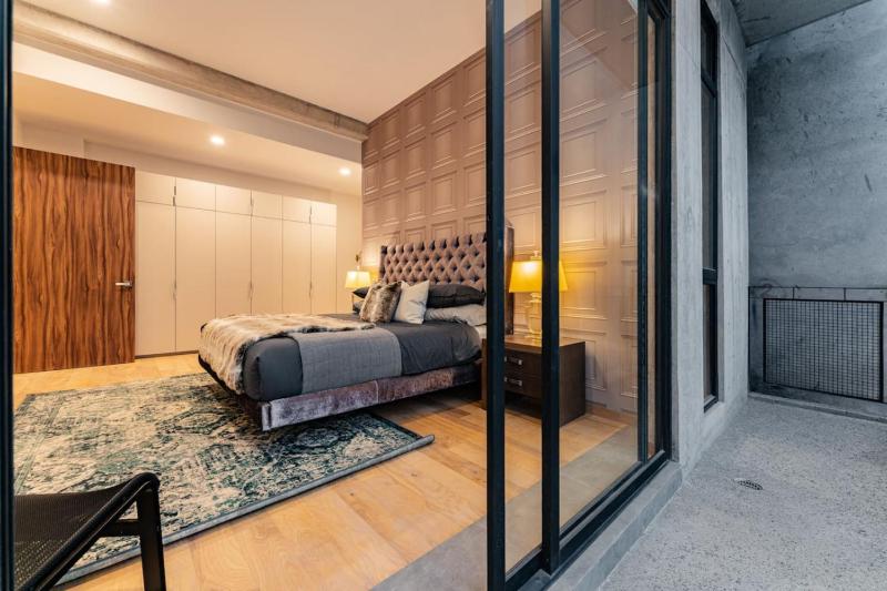 Spacious Roma Norte Loft with Art & City Views - image 50